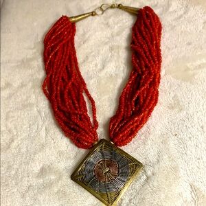 Vintage 20 Strand Coral Bead Necklace W/ Copper, Silver and Gold woven Medallion